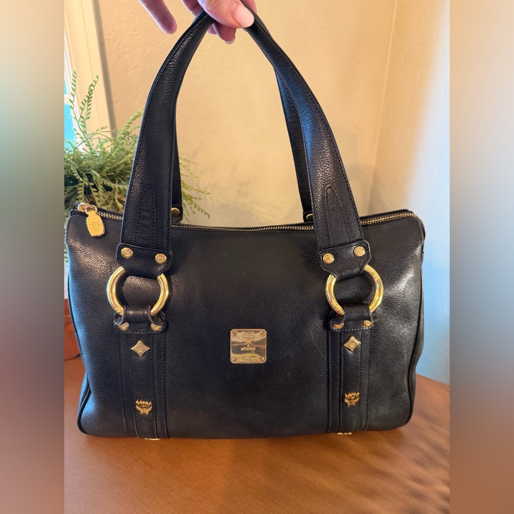 MCM Black Leather Bag with Gold Emblem- COA